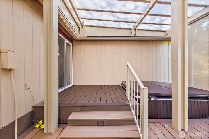 The slider in the primary leads to the upper portion of the deck, by the hot tub.