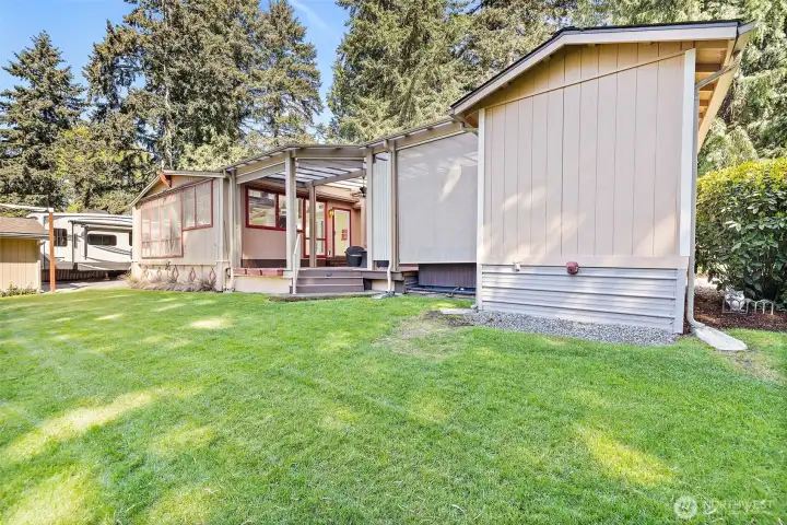 The back of the home and the deck.
