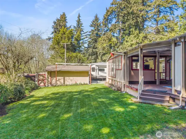 Detached garage with workbench.