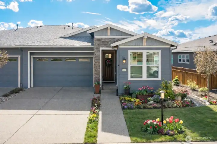 Just under 1,700 SF, this 3-bath, 2 bed-home plus den offers over $126,000 in BOTH construction upgrades and owner improvements. Backyard is wonderful and truly easy maintenance. Perfect home for traveling, whether on vacation or business assigment. Easy maintenance hardscaping, with extended covered and electric-screened patio. Perfect for enjoyment and privacy. Inside upgrades, conveniences and style shines EVERYWHERE! (Photo modestly using AI to present bulbs, shrubbery & trees about to bloom like crazy!)