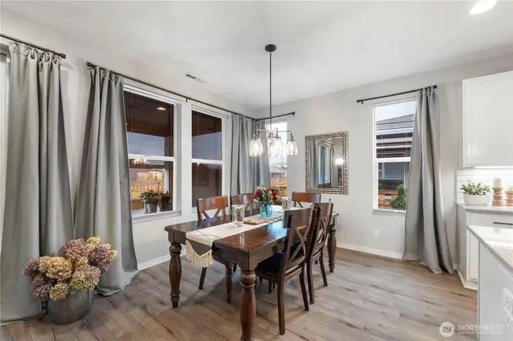 Generously sized dining easily accommodates an 8-seat table with room for a side server, baker’s rack or hutch! Plenty of seating for friends and family - whether you're hosting a "Pour at Four" night or holiday dinner.