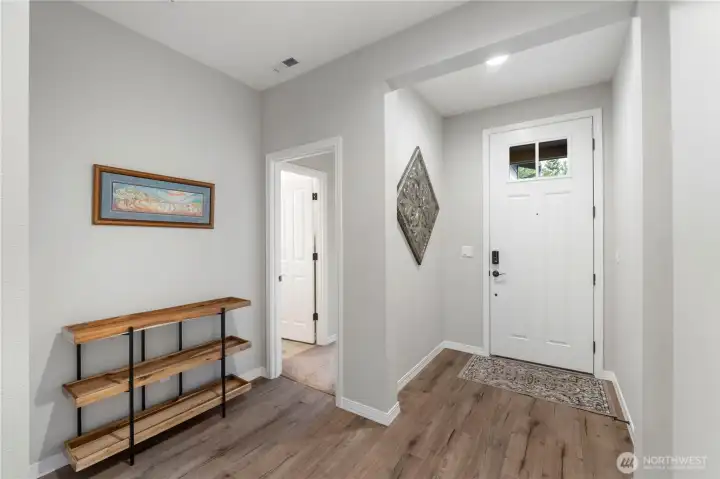 Widely welcoming foyer finishes out a "Junior Suite" nicely, with private entrance to a bedroom and full bath.