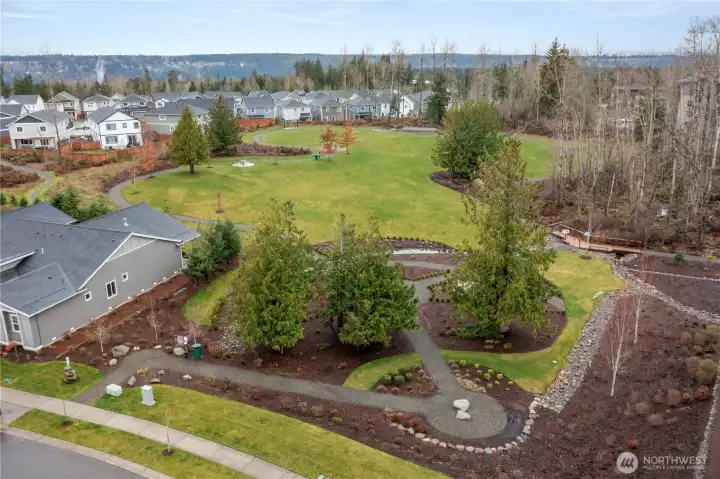 REFLECTION PARK – is just one short block from your front door. One of 17 unique parks, each with its own feel and features, this is a local FAVORITE because it is comprised of forested paths winding over wetland boardwalks, low-impact fitness stations, game board tables, and a mini neighborhood book exchange. SO TEHALEH!!