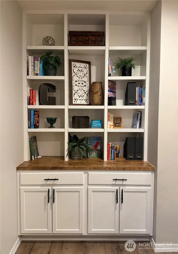 Built-in added by owner in the den / office. Other shelving and storage improvements from one end of the home to the other!!