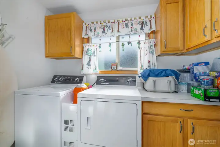 Plenty of cabinets for storage here as well as the H2O heater