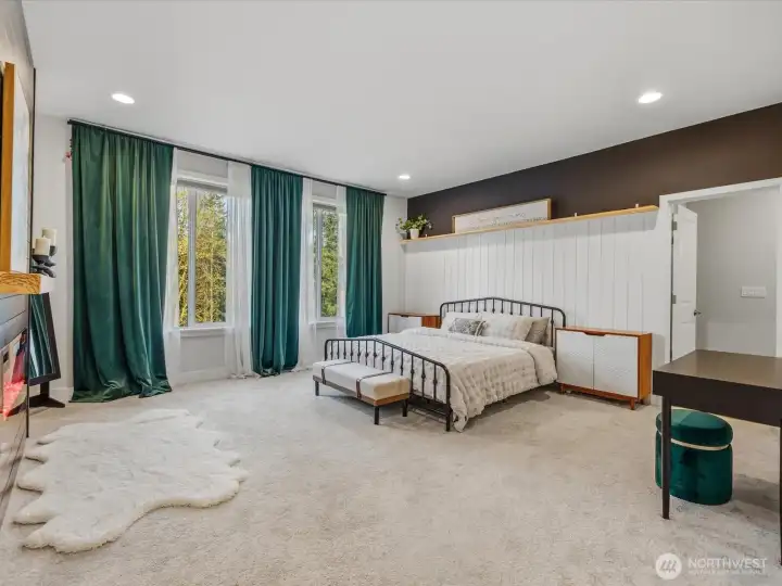 Primary bedroom is bright and spacious.