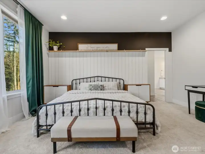 The primary bedroom comfortably fits a King size bed.