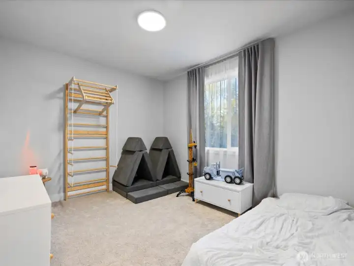 Fourth bedroom on the upper level (this one is closest to the primary bedroom).