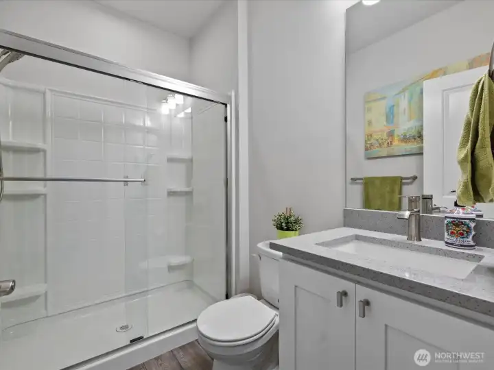 Bathroom dedicated for the lower level bedroom and rec room.