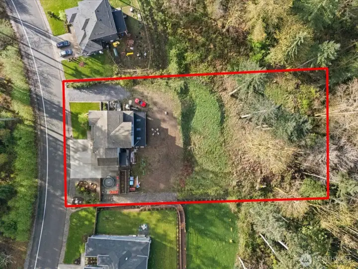 Huge one-acre lot provides privacy and tranquility.
