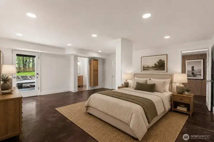 Virtually staged oversized bedroom in lower level with separate access & 3/4 bath ensuite, and w/d hookups!
