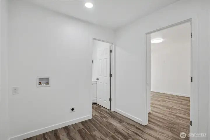 From laundry room is the first bedroom and 3/4 bathroom
