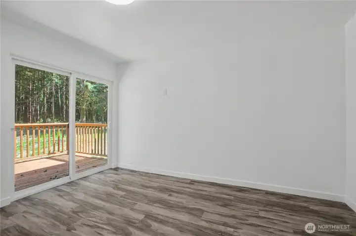Frist bedroom, has sliding glass door out to backyard - Great space for an office.