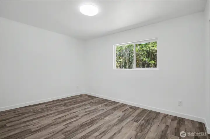 Second bedroom just off of living room just past the stairs.