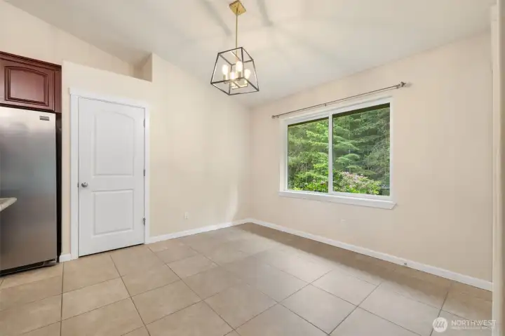 Dining room with high ceiling