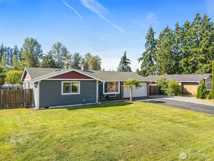 Double gates on the left side of home, well maintained spacious front yard