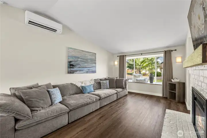 Plenty of room for any size couch, notice the ductless mini-split and sunny window seat