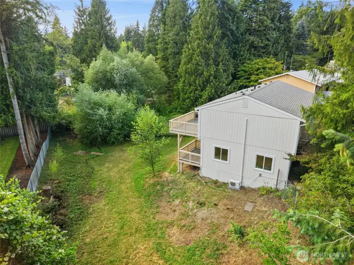 A fully fenced backyard offers room for pets, play, entertaining, landscaping, and a backyard cottage with creative potential. A fully fenced backyard offers room for pets, play, entertaining, landscaping, and a backyard cottage with creative potential.