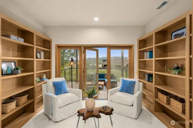 Custom built library is perfect for the quite reading time inside or out on the deck!