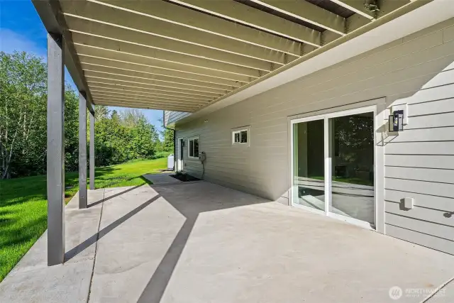 Downstairs sliding door to covered patio.