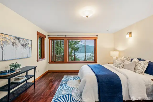 Main floor primary bedroom with water views