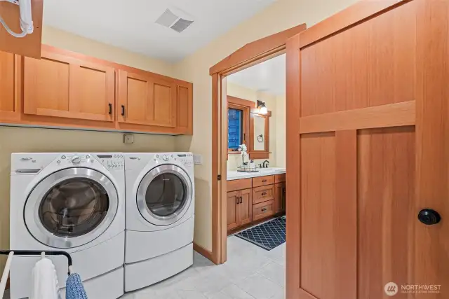 Primary walk in closet with washer & dryer unit