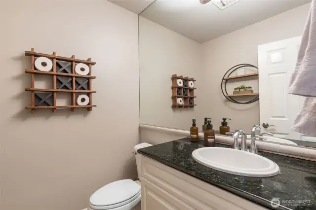 Lavish main level guest bath.