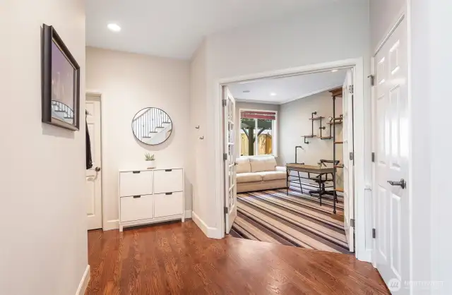 Double glass doors to the main level bedroom or work from home office with adjacent 3/4 bath.