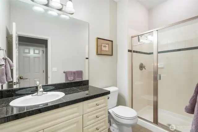 Main level 3/4 bath for guests or extended family.