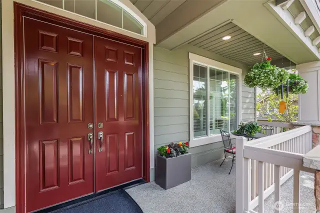 Covered, double door entry.