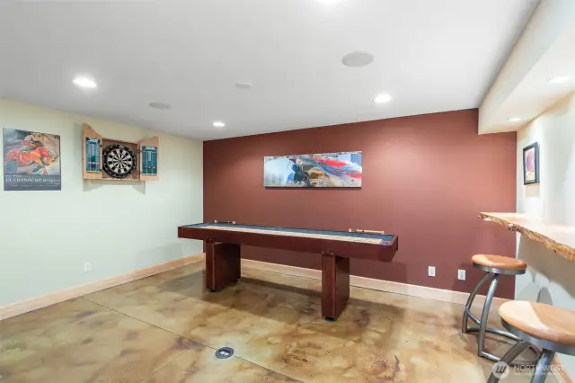 Secondary lower level game room perfect for the table of choice.