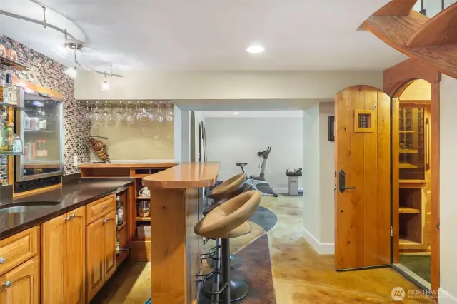 Lavish wet bar with wine cooler.