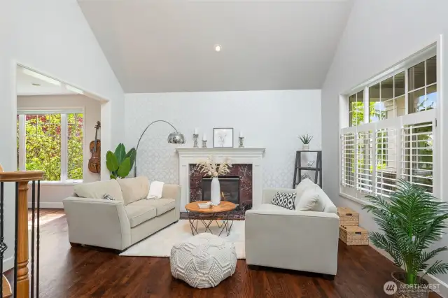 Formal living area with gas fireplace.