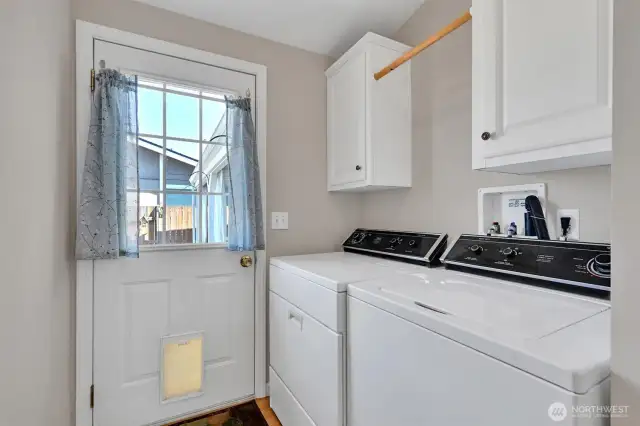 Laundry made easy with this tucked-away, functional space.