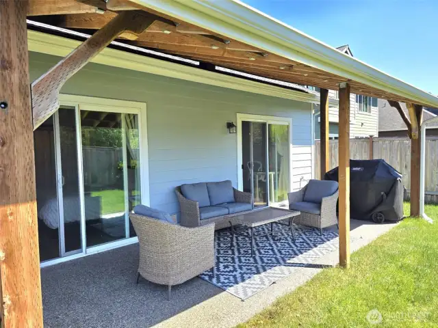 Covered Patio backs onto open space.