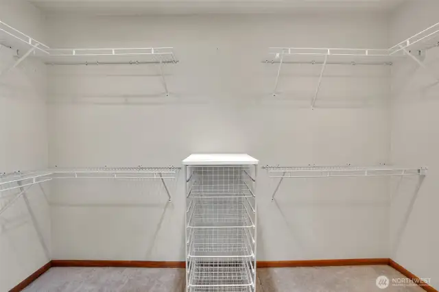 walk in closet in primary bedroom