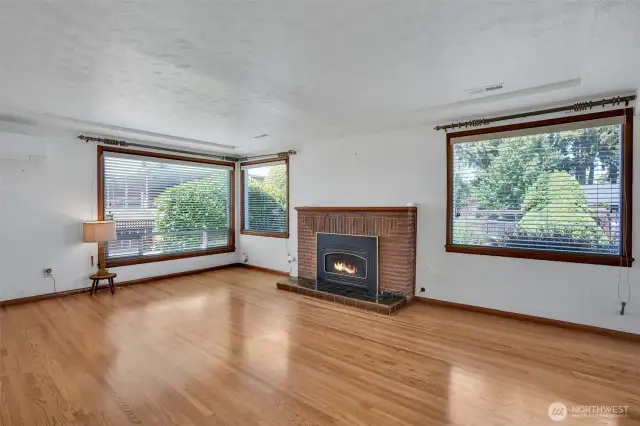 Welcome to your spacious and well lit living area with fireplace.