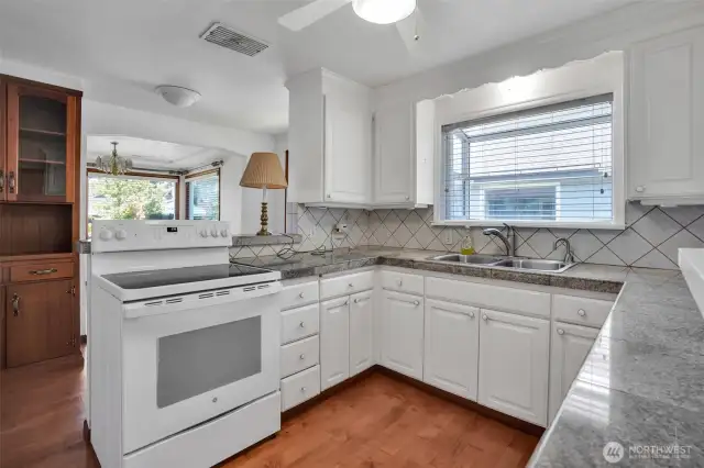 built in storage that can be accessed from both sides (kitchen and dining room), nice gargen window over sink!