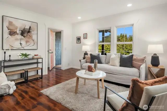 The living room is spacious and versatile with fantastic light. No carpet anywhere in the house.