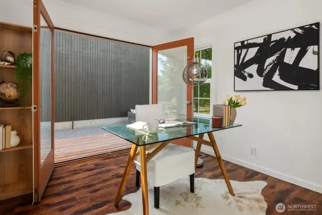 The second bedroom features french doors that go out to the back deck. There is another "man door" off the kitchen making 2 access points to the back.