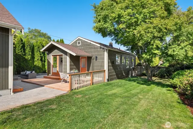 A sizable side yard on south side of the house provides a nice buffer and ample yard space.