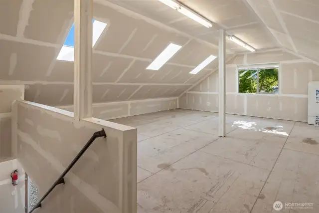 The upper floor is equally huge and fully sheetrocked.