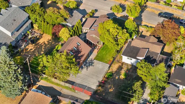 Looking down from above gives you a good sense of how the property lays out. The red gates are off the alley in the lower center of the picture.