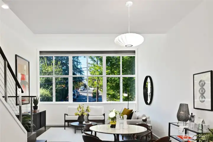 The sun-filled main level features west-facing views toward Lee Street, highlighted by expansive windows, clean architectural lines, and an open, functional layout—the hallmarks of classic MCM design. Freshly painted throughout, this stunning in-city home is move-in ready. Welcome home.