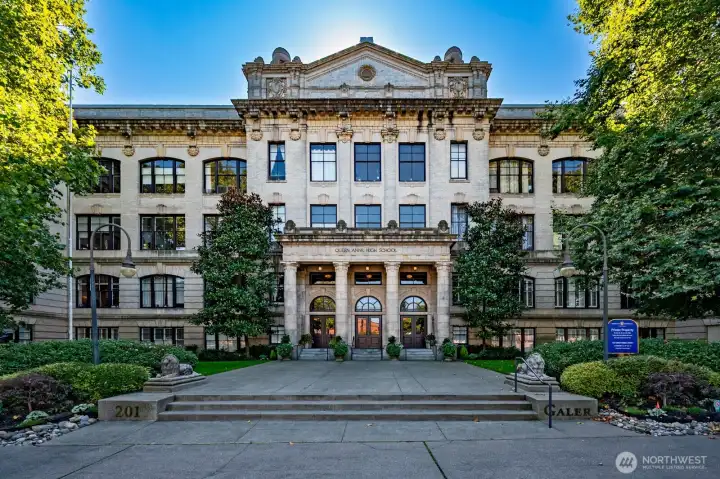 The stately 1908 Queen Anne High School, a neoclassical treasure, and the 1955 Industrial Arts Building, a mid-century modern gem, unite to create one of Seattle’s most iconic condominiums—where timeless architecture meets inspired living.