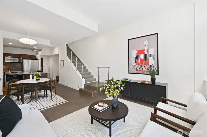 The straight staircase separates the main level from the bedroom level and view deck.