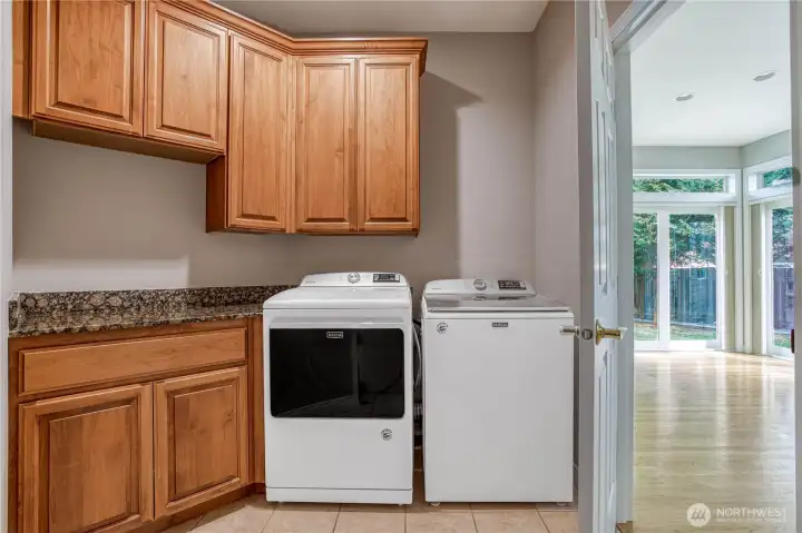 Laundry with included washer and dryer.
