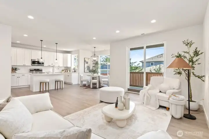 Interior photo shown is from a similar new construction home by the same builder. Fixtures, flooring, floor plan, and finishes are representative and may differ from the home currently under construction.