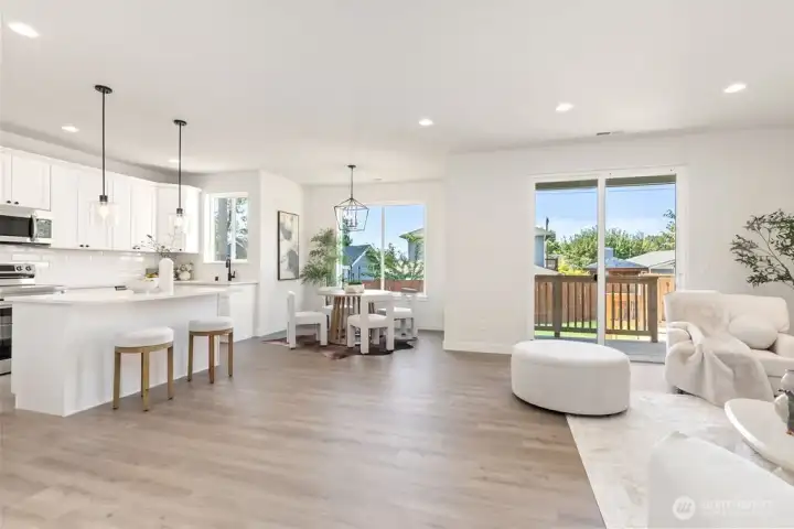 Interior photo shown is from a similar new construction home by the same builder. Fixtures, flooring, floor plan, and finishes are representative and may differ from the home currently under construction.