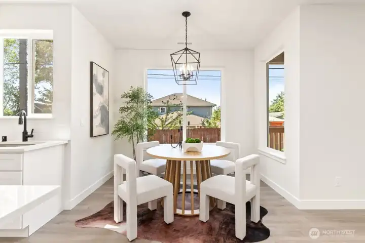 Interior photo shown is from a similar new construction home by the same builder. Fixtures, flooring, floor plan, and finishes are representative and may differ from the home currently under construction.